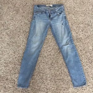 Hollister light blue jeans with holes/distressed.